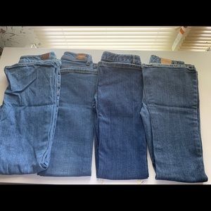 4 pair of girl jeans